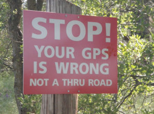 Road sign stating GPS is wrong